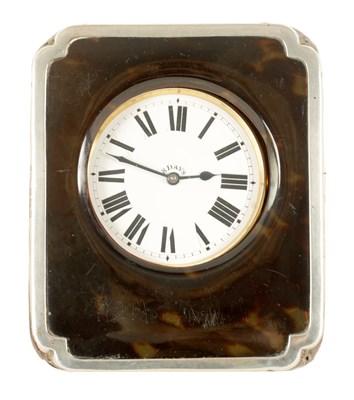 Lot 1270 - AN EARLY 20TH CENTURY SILVER AND TORTOISESHELL EIGHT-DAY DESK CLOCK