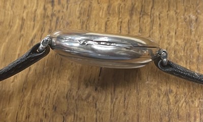 Lot 319 - A 1920s GENTLEMAN’S SILVER LONGINES WRISTWATCH