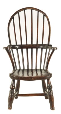 Lot 837 - A 19TH CENTURY PRIMITIVE ELM AND FRUITWOOD STICK BACK CHILD’S WINDSOR CHAIR