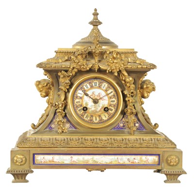 Lot 672 - A 19TH CENTURY FRENCH PORCELAIN PANELLED ORNATE CAST BRASS MANTEL CLOCK