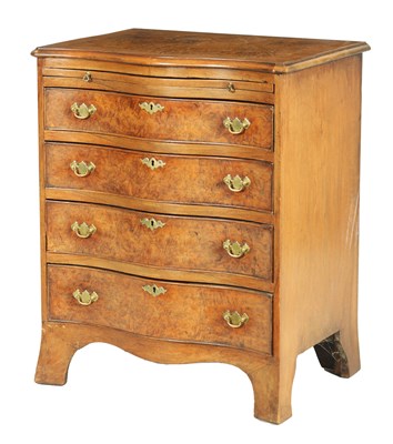 Lot 1227 - A 20TH CENTURY GEORGE I STYLE RICHLY FIGURED WALNUT SERPENTINE CHEST OF SMALL SIZE