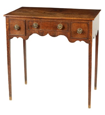 Lot 1073 - A GEORGE III OAK SIDE TABLE