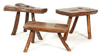 Lot 821 - A COLLECTION OF THREE 18TH/19TH CENTURY PRIMITIVE MILKING STOOLS