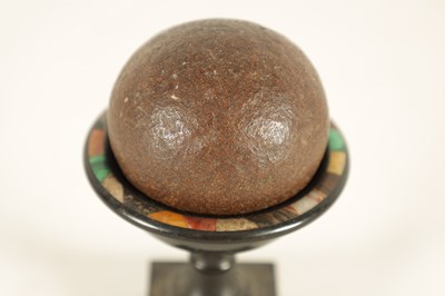 Lot 545 - A BEZOAR STONE, POSSIBLY 18TH CENTURY IN A GRAND TOUR MARBLE SPECIMEN HOLDER