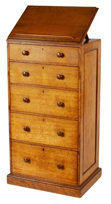 Lot 889 - GILLOWS & CO. A 19TH CENTURY OAK FREE-STANDING PANELLED TALL CHEST OF DRAWERS