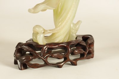 Lot 155 - A FINE 19TH CENTURY CARVED JADE SCULPTURE OF A GEISHA