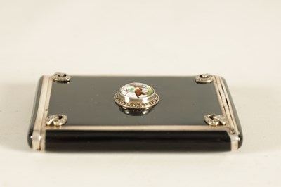 Lot 219 - A LATE 19TH/EARLY 20TH CENTURY SILVER AND BLACK ENAMEL LADIES CIGARETTE CASE