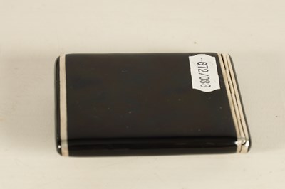 Lot 219 - A LATE 19TH/EARLY 20TH CENTURY SILVER AND BLACK ENAMEL LADIES CIGARETTE CASE