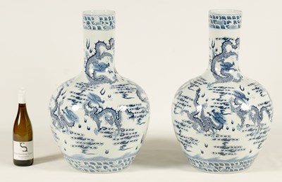 Lot 107 - A LARGE PAIR OF LATE 19TH CENTURY CHINESE BLUE AND WHITE BOTTLE NECK VASES