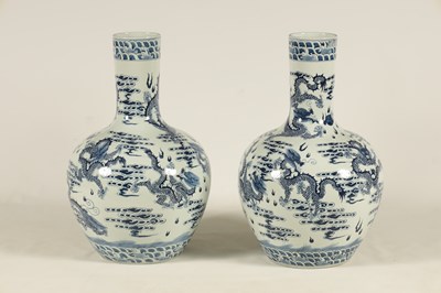 Lot 107 - A LARGE PAIR OF LATE 19TH CENTURY CHINESE BLUE AND WHITE BOTTLE NECK VASES