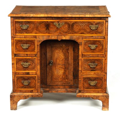 Lot 940 - AN EARLY 18TH CENTURY OYSTER VENEERED LABURNUM KNEEHOLE DESK