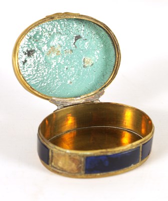 Lot 237 - A 19TH CENTURY FRENCH BRASS CASED OVAL ENAMEL SNUFF BOX