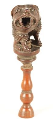 Lot 587 - A 19TH CENTURY WALNUT TREEN CARVED NUT CRACKER