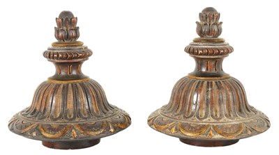 Lot 511 - A PAIR OF 19TH CENTURY CARVED MAHOGANY AND GILT HIGH-LIGHTED VASE COVERS