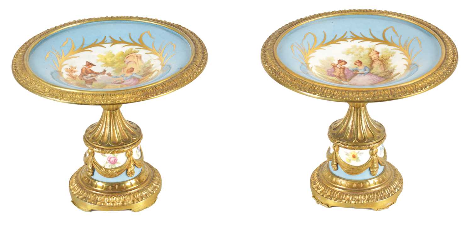 Lot 51 - A PAIR OF 19TH CENTURY ORMOLU MOUNTED FRENCH SEVRES PORCELAIN TAZZAS
