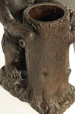 Lot 600 - AN IMPRESSIVE 19TH CENTURY LINDEN WOOD BLACK FOREST CARVED BEAR STICK STAND