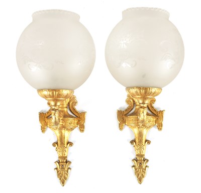 Lot 1395 - A PAIR OF 20TH CENTURY BRASS WALL LIGHTS WITH OPAQUE GLASS CIRCULAR SHADES