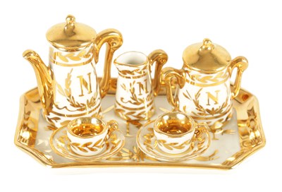 Lot 59 - AN EARLY 20TH CENTURY MINIATURE LIMOGES PORCELAIN FRENCH NAPOLEON TEA SERVICE