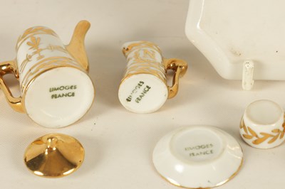 Lot 47 - AN EARLY 20TH CENTURY MINIATURE LIMOGES PORCELAIN FRENCH NAPOLEON TEA SERVICE