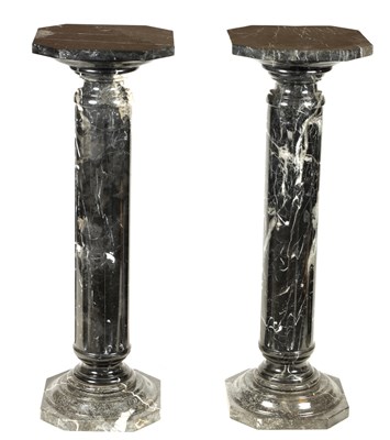 Lot 613 - A PAIR OF 19TH CENTURY VEINED BLACK MARBLE REEDED COLUMNS