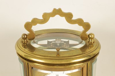 Lot 670 - A LATE 19TH CENTURY FRENCH OVAL REPEATING CARRIAGE CLOCK