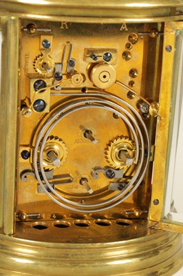 Lot 670 - A LATE 19TH CENTURY FRENCH OVAL REPEATING CARRIAGE CLOCK