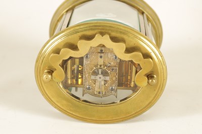 Lot 670 - A LATE 19TH CENTURY FRENCH OVAL REPEATING CARRIAGE CLOCK