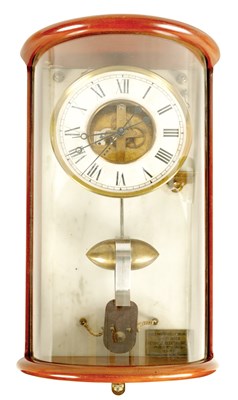 Lot 697 - PAUL MORET, 1933. A BOULLE STYLE ELECTRIC WALL CLOCK