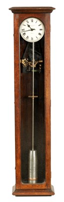 Lot 809 - AN EARLY 20TH CENTURY GILLETT & JOHNSTON  OAK CASED ELECTRIC MASTERS CLOCK