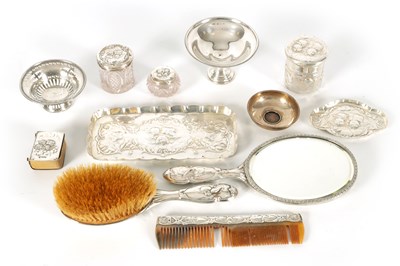 Lot 366 - AN ART NOVEAU SILVER NINE PIECE DRESSING TABLE SET