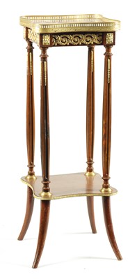 Lot 1119 - A 20TH CENTURY FRENCH GILT BRASS MOUNTED MAHOGANY SHAPED JARDINIERE STAND