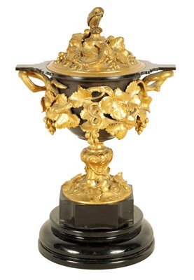 Lot 689 - A 19TH CENTURY FRENCH BRONZE AND ORMOLU VASE AND COVER