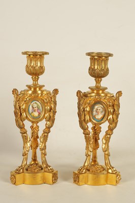 Lot 688 - A PAIR OF 19TH CENTURY FRENCH ORMOLU AND PORCELAIN PANELLED CANDLESTICKS