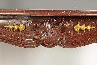 Lot 627 - A FINE 19TH CENTURY FRENCH ROUGE MARBLE AND ORMOLU MOUNTED SERPENTINE ROCOCO FIRE PLACE