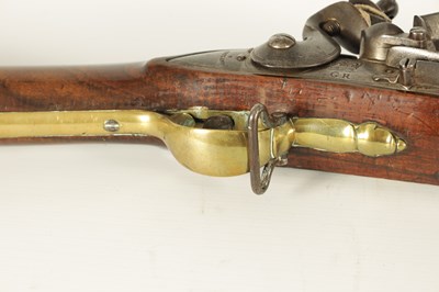 Lot 398 - AN EARLY 19TH CENTURY BROWN BESS FLINTLOCK RIFLE BY WILLIAM KETLAND