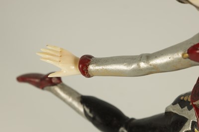 Lot 704 - AN ART DECO COLD PAINTED BRONZE AND IVORY FIGURE OF A FEMALE JESTER