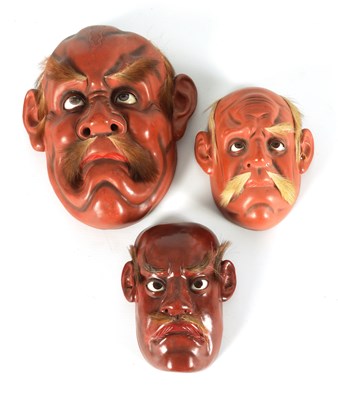 Lot 200 - A GROUP OF THREE JAPANESE MEIJI PERIOD LACQUER WORK FACE MASKS