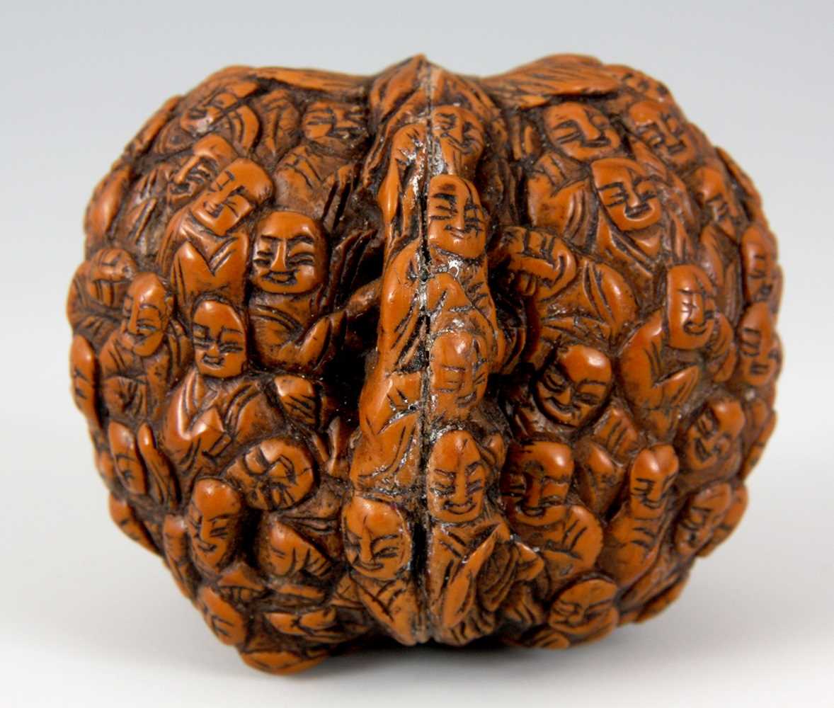 Lot 63 - A 19th CENTURY JAPANESE CARVED WALNUT...