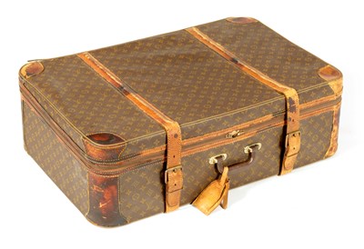 Lot 634 - A VINTAGE LOUIS VUITTON SUITCASE