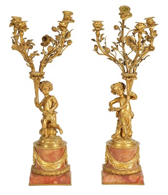 Lot 650 - AN IMPRESSIVE PAIR OF 19TH CENTURY FRENCH GILT BRONZE AND ROUGE MARBLE FOUR BRANCH CANDELABRA