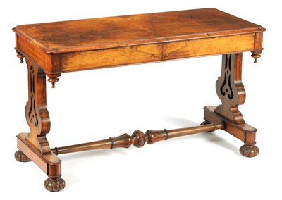 Lot 1049 - A GEORGE IV FIGURED WALNUT LIBRARY TABLE