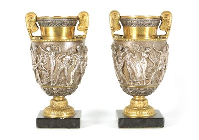 Lot 647 - A PAIR OF LATE 19TH CENTURY BRONZE AND SILVERED BRONZE GRAND TOUR URNS