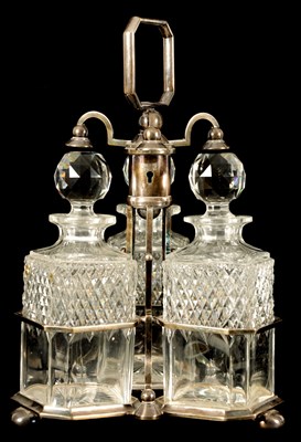 Lot 358 - AN UNUSUAL LATE 19TH CENTURY SILVER PLATED THREE BOTTLE BERESFORD’S PATENT TANTALUS