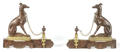 Lot 511 - A PAIR OF 19TH CENTURY CAST IRON AND BRASS MOUNTED HEARTH DOGS