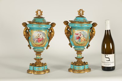 Lot 74 - A PAIR OF 19TH CENTURY FRENCH SEVRES STYLE ORMOLU MOUNTED VASES AND COVERS