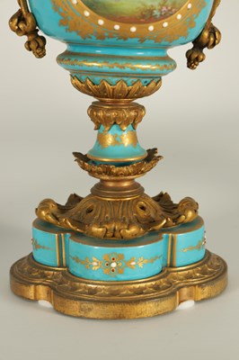 Lot 74 - A PAIR OF 19TH CENTURY FRENCH SEVRES STYLE ORMOLU MOUNTED VASES AND COVERS