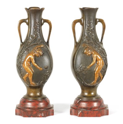 Lot 667 - E PROVOST  A PAIR OF LATE 19TH CENTURY BRONZE TWO HANDLED FLATTENED OVOID VASES ON ROUGE MARBLE BASES