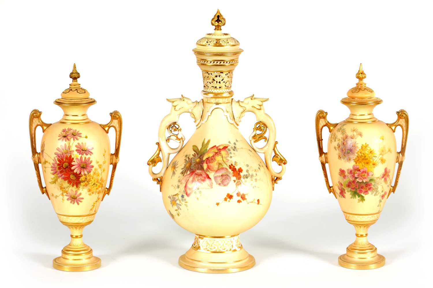 Lot 52 - AN ORNATE ROYAL WORCESTER GILT AND IVORY GROUND SCROLLED TWO-HANDLED CABINET VASE AND COVER