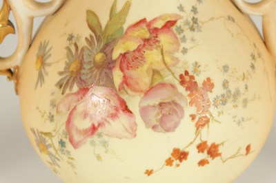 Lot 52 - AN ORNATE ROYAL WORCESTER GILT AND IVORY GROUND SCROLLED TWO-HANDLED CABINET VASE AND COVER