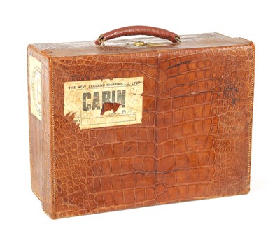 Lot 709 - AN EARLY 20TH CENTURY CROCODILE SKIN SUITCASE